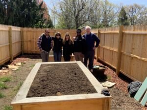 Rockwell Custom volunteer group yardwork