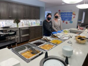 Staff serving Dinner